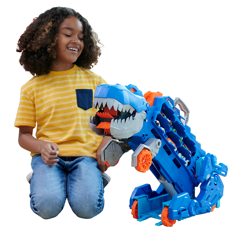 Hot Wheels City Der Ultimative Transporter verwandelt sich in einen T-Rex mit Rennstrecke, Aufbewahrung von mehr als 20 Autos