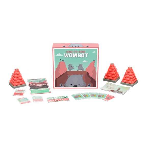 Asmodee Hand To Hand Wombat A social deduction game for people who aren’t into social deduction games”. Players are secretly assigned roles, either ‘Good Wombat’ or ‘Bad Wombat’ (wombats are known for their binary systems of morality), whereupon Good Wombats must construct towers together, while Bad Wombats try to disrupt the process. This is all done with eyes closed, and, after a set time limit, the group must stop and try to identify the Bad Wombats. Kartenspiel